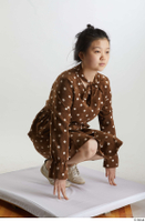    Aera  1 brown dots dress casual dressed kneeling white oxford shoes whole body 0008.jpg